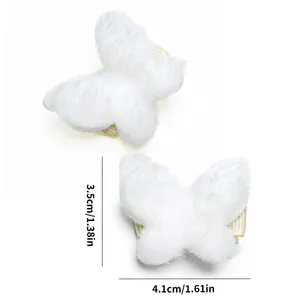 Size detail of two white plush butterfly hair clips for dogs and cats measuring 4.1cm