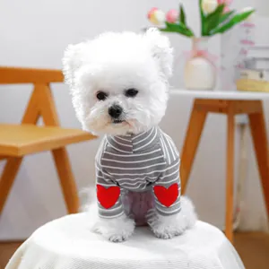 Detail of grey striped pet sweater with red heart patches on sleeves for small dogs