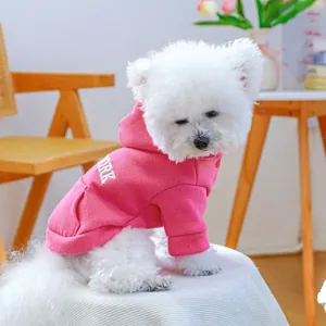 Detail of pink dog hoodie with white lettering and soft fleece fabric for small dogs