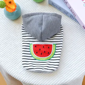 Detail of waffle fabric hood and striped pet hoodie with a watermelon embroidery patch