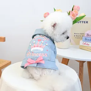 Detail of dog denim jacket with Daddy's Princess embroidery, pearls and pink bow