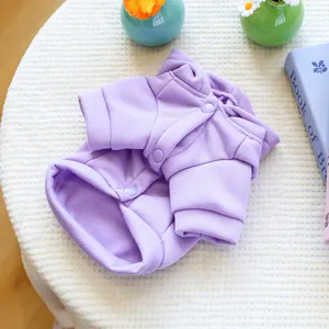 Detail of light purple pet sweatshirt with plush lining and matching round buttons