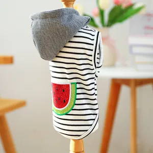 Detail of pet hoodie with striped fabric, sequin watermelon, and waffle texture hood