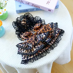Breathable leopard print tutu dress for dogs with lace trim and heart bow decoration
