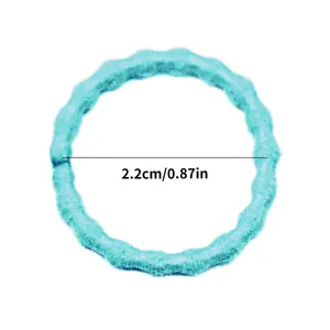 Detail view of small 2.2cm blue elastic hair band with wave texture for pets
