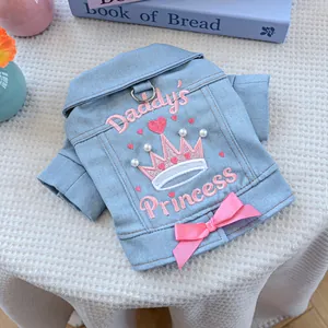 Detail of blue denim pet jacket with pink Daddy's Princess embroidery and pearls