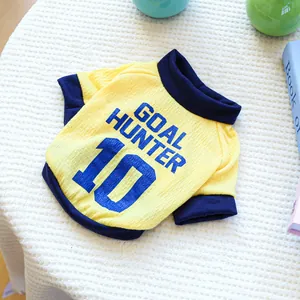 Detail of yellow ribbed pet t-shirt with navy GOAL HUNTER 10 print and contrasting trims