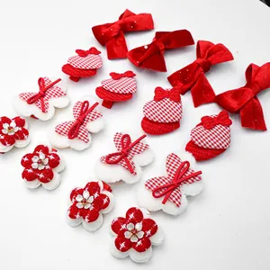 Cute red and white bow hair clips set for pet dogs and cats with velvet heart patterns