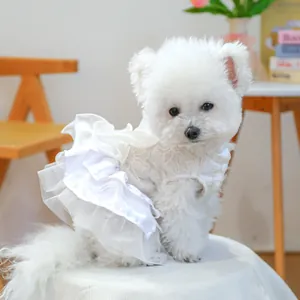 Detailed view of dog wedding dress featuring exquisite lace embroidery and layered tulle