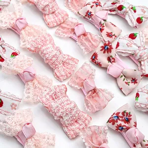 Cute pink pet bow hair clips set with lace, floral, and strawberry patterns