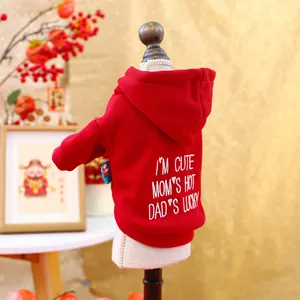 Detail of red festive pet hoodie with festive greeting print for dogs and cats