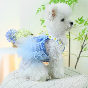 Detail of blue plaid pet dress with daisy collar and organza skirt for small dogs