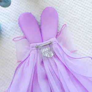 Detail view of purple pet bunny dress with 100% polyester fabric and metal clip fastener