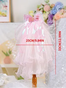 Pink multi-layer tulle pet veil with sequined bow and wavy edges detail on stand