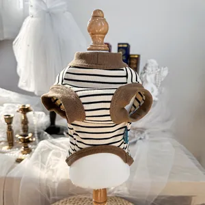 Close-up of retro striped pet vest with rib-knit cuffs on a white dog mannequin