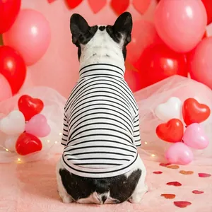 Striped pet t-shirt for dogs featuring a turtleneck design in a romantic festive setting