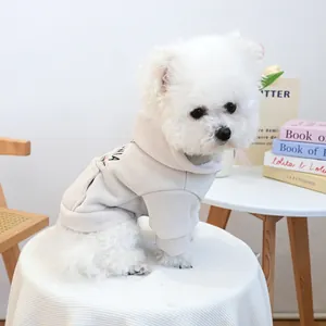 Cute dog hoodie in off-white fleece featuring floral embroidery and warm hood for winter
