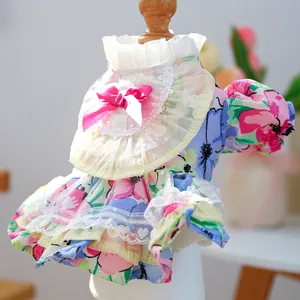 Detailed layered lace hem and pink bow on floral dog summer dress for small dogs