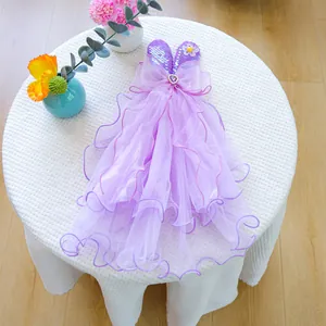 Detail of purple sequin heart pet dress with lace bow and layered mesh tulle