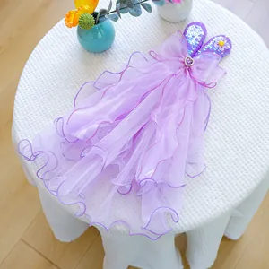 Detail of purple tulle pet wedding veil with sequined rabbit ears and heart gems