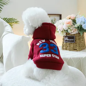 Close-up of burgundy dog hoodie featuring New York 33 print on soft fleece fabric