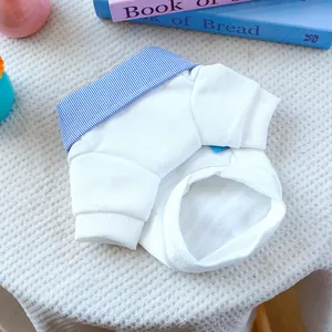 Detail of white pet sweatshirt with blue striped shirt collar and fleece lining