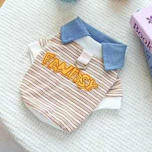 Detail of dog striped shirt with denim collar, orange embroidery and metal D-ring
