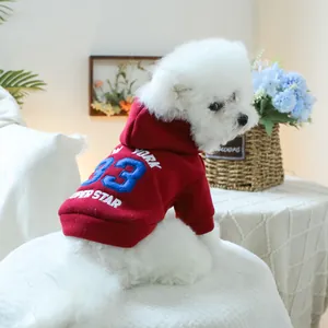 Detail of red pet hoodie with New York 33 superstar embroidery for small dogs
