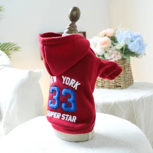 Detailed close-up of red dog hoodie featuring New York 33 embroidery on soft cotton