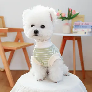 Detail of green striped pet knit vest with soft ribbed cuffs for small dogs and cats