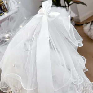 Elegant white lace pet wedding veil with satin bow and pearls for small dogs