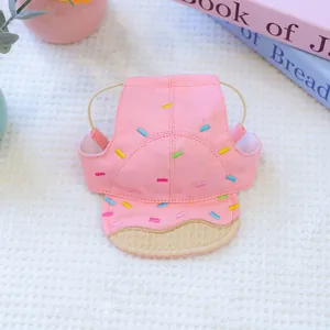 Detail of pink donut pet sun hat with sprinkle embroidery and ear holes for small dogs