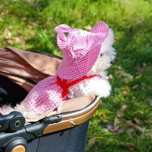 Pink gingham pet dress with matching sun hat and red bow detail for small dogs
