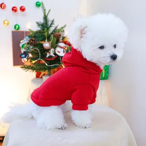 Red Christmas pet hoodie for small dogs made of soft fleece worn by a white Bichon