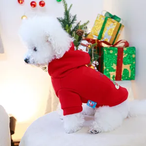 Festive red pet hoodie for small dogs featuring soft fleece and a warm holiday design