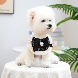 Elegant white knit pet sweater with black tweed collar and pearl bow for small dogs