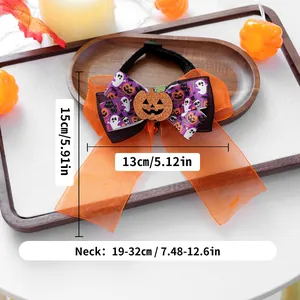 Détail du nœud papillon Halloween pour animaux avec motifs citrouilles et mesures