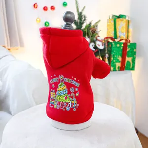Detail of red Christmas pet hoodie with festive tree print on warm holiday sweater