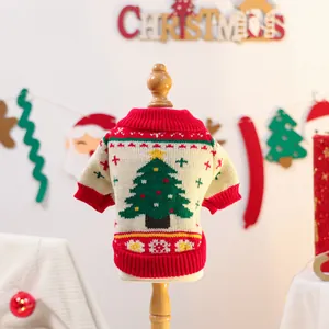 Detailed close-up of knit pet sweater with Christmas tree jacquard and ribbed edges