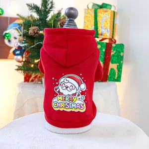 Detail of red pet hoodie featuring a cartoon Santa Claus and Merry Christmas text