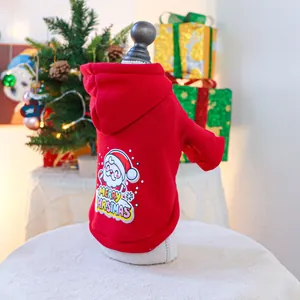 Detail of red pet Christmas hoodie with Santa Claus print and soft fleece fabric texture