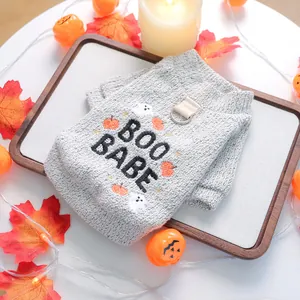 Halloween pet knit vest with Boo Babe pumpkin pattern and D-ring on a festive background