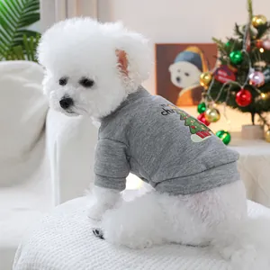 Detail of grey pet Christmas sweater with tree print and ribbed cuffs on white dog