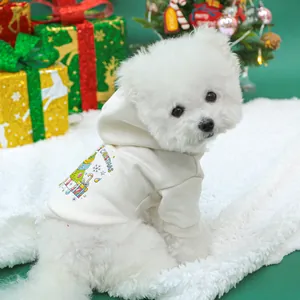 Detail of pet Christmas hoodie on a Bichon Frise dog with festive tree print