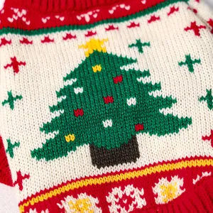 Close-up of Christmas pet sweater featuring a knitted holiday tree and ribbed collar