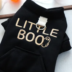 Detail of Little Boo embroidery on black pet hoodie with metal D-ring for leash