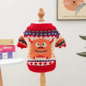 Cozy knit pet sweater for small dogs and cats with orange monster pattern in red and cream