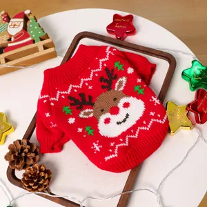 Detailed knit of red Christmas pet sweater featuring reindeer jacquard and ribbed cuffs