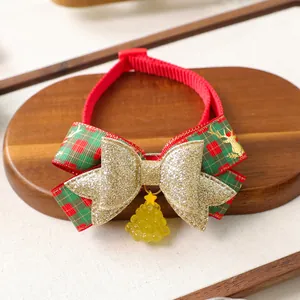 Christmas dog collar with red plaid bow, gold sequins, and a festive tree pendant