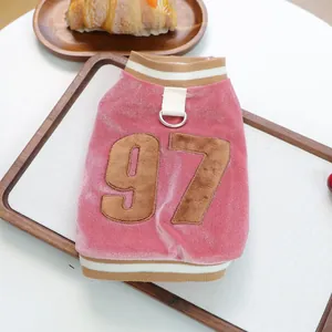 Pink velvet pet vest with embroidered 97 and metal D-ring for leash attachment